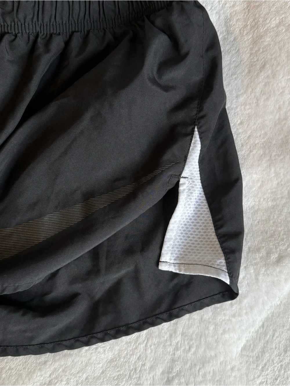 Black Nike running track shorts